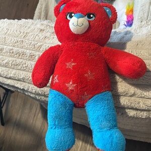 Red and Blue Wonder Woman build a bear as shown